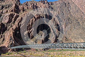 Hikers on The Silver Bridge That Spans The Colorado River