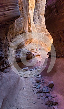 Hikers in slot canyon