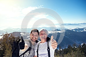 Hikers with thumb up