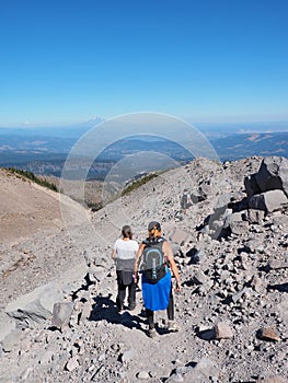 Hikers on the Timberline Trail on Mount Hood, Oregon.