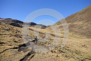 Hikers on trail in high Andes