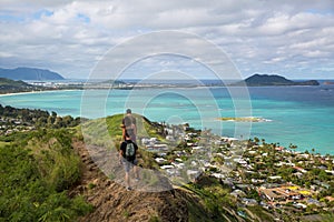 Hikers with the view of Lanikai from a top the Pillbox hiking tr
