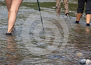 hikers walking on Rio Pilon in Monterrey, mountain water