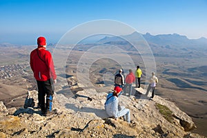 Hikers watch the terrain