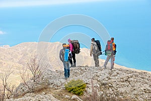 Hikers watch the terrain
