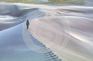 Hiking Across Sand Dunes