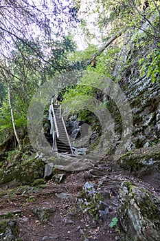 Hiking along the canyon Gorges Mysterieuses de Tete Noire in Trient, region of Martigny in Valais, Swiss Alps, Switzerland