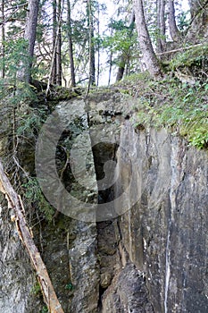 Hiking along the canyon Gorges Mysterieuses de Tete Noire in Trient, region of Martigny in Valais, Swiss Alps, Switzerland