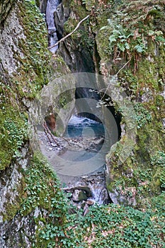 Hiking along the canyon Gorges Mysterieuses de Tete Noire in Trient, region of Martigny in Valais, Swiss Alps, Switzerland