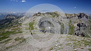 Hiking along a mountain ridge overlooking the two valleys of Saint Veran and Ceillac Cristillan