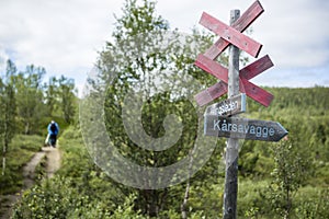 Hiking along a walking trail in Lappland.