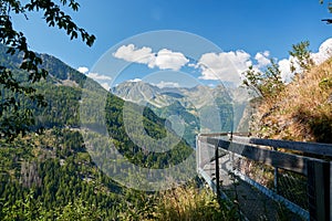 Hiking along the watercourse of Bisse of Trient in the Swiss alps in the region of Martigny in Valais, Switzerland