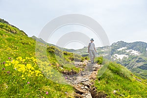 Hiking in the Alps on panoramic footpath