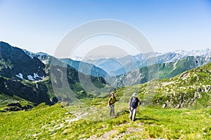 Hiking in the Alps on panoramic footpath