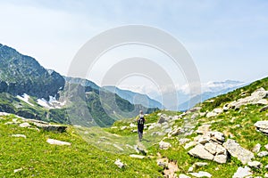 Hiking in the Alps on panoramic footpath