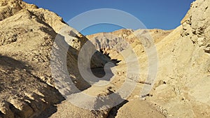 Hiking in the beautiful Golden Canyon at Death Valley