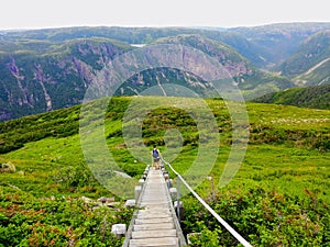 Hiking in beautiful Gros Morne National Park atop Gros Morne Mountain in Newfoundland and Labrador, Canada photo