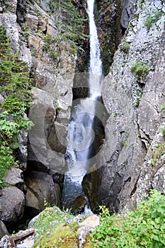 Hiking in the beautiful trail of Gorges Du Dailley in the Valais, Switzerland in summer 2023 photo