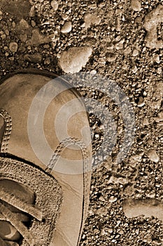 Hiking boot shoe hard arid dried soil