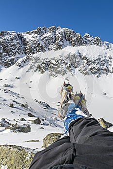 Hiking boots with crampons semiautomatic