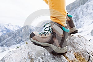 Hiking boots on mountain rocks