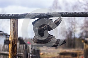 Hiking boots and rope on campfire background. Lifestyle travel relationship.