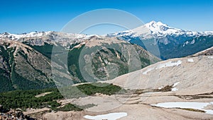 Hiking, camping and backpacking on iceberg and snow with the views of the Andes mountains and lake near Refugio Italia Manfredo photo