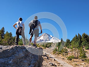 Hiking couple on the Tilly Jane Trail on Mount Hood, Oregon.
