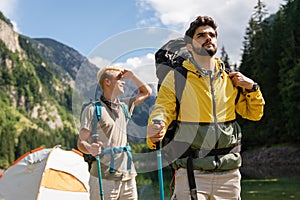 Hiking with friends is so fun. Group of young people with backpacks together