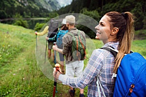 Hiking with friends is so fun. Group of young people with backpacks together