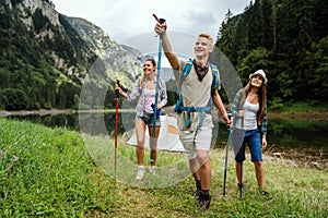 Hiking friends travel outdoor group sport lifestyle concept