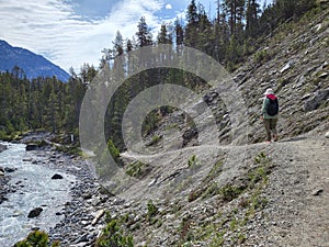 Hiking in Fuorn valley in Swiss National Park.