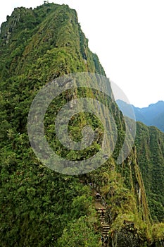 Hiking the Huayna Picchu mountain at Machu Picchu historic site in Cusco Region, Peru