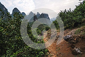 Hiking in the Karst mountains in Guilin region of South China, close to Xingping village, Li River