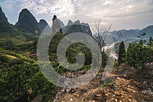 Hiking in the Karst mountains in Guilin region of South China, close to Xingping village, Li River