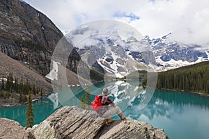 Hiking Man Looking Moraine Lake & Rocky Mountains