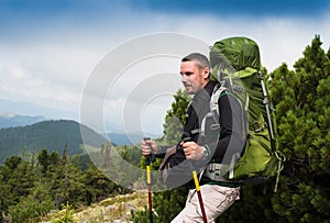 Hiking man portrait with backpack