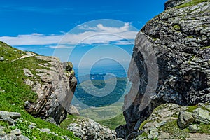 Hiking in the Monviso valleys between streams, waterfalls and flowery pastures