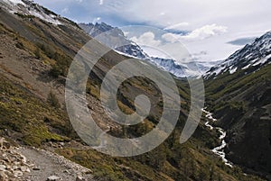 Hiking through mountain pass to camp Chileno, torres del Paine photo