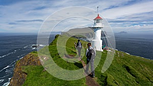 Hiking on the Mykines island in Faroe Islands