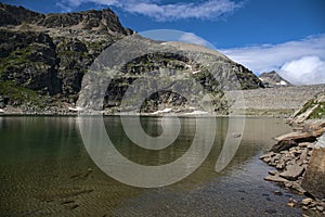 Hiking in MÃ¶lltaler Glacier area, high mountains, glacier, waterdams and cows on pastures