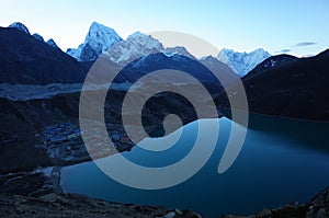 Hiking in Nepal Himalayas, View of Gokyo village, Gokyo lake, Ngozumba glacier, Arakam Tse and Cholatse mountain