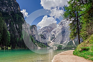 Hiking path along the pearl of the Dolomites, the Pragser wildsee photo