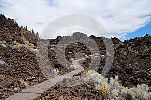 Hiking path in a gigantic lava field of an old volcanic eruption