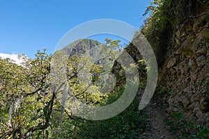 Hiking path at high altitude Peruvian mountains between Choquequirao and Maizal, Peru photo