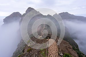 Hiking path near the mountain peak Pico do Arierio on Madeira Island