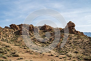 Hiking path up rocky desert landscape Sierra Nevada Alabama Hills