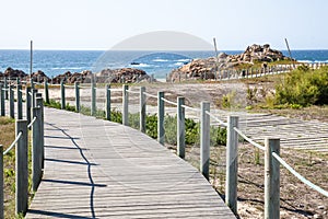 Hiking path of wood on coast