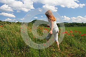 Hiking on poppies field