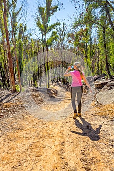 Hiking in regenerating bushland after fire